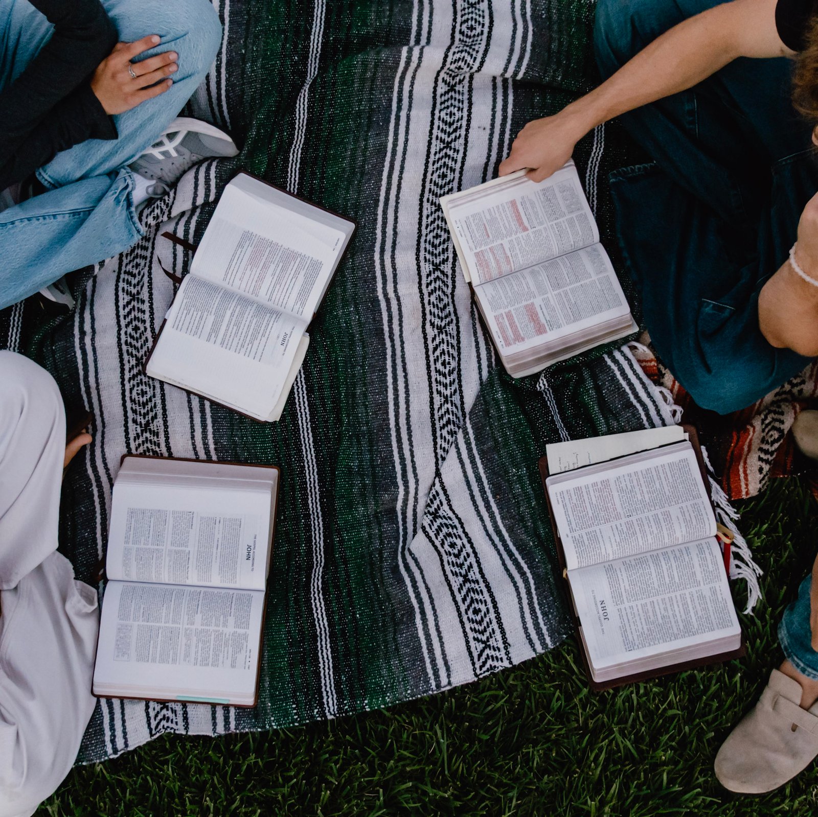Open Bibles at an outdoor group study